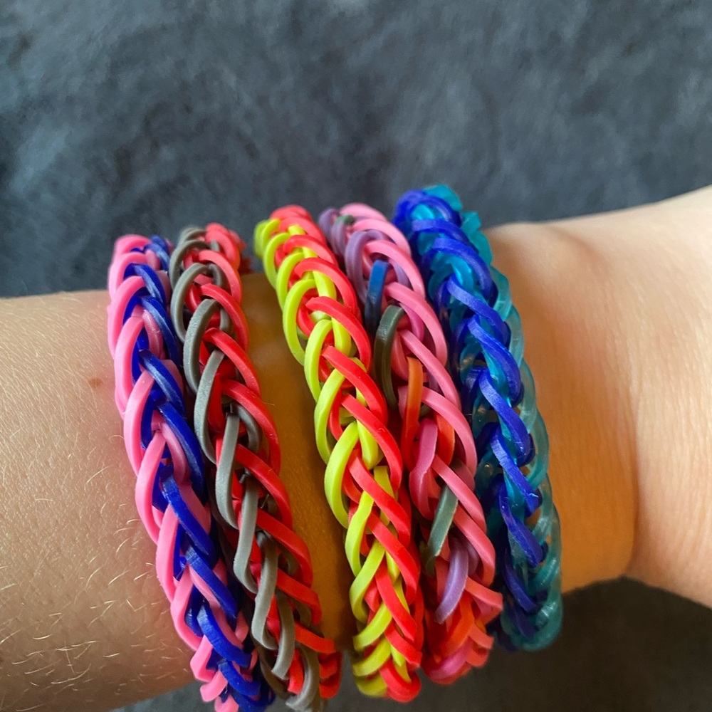 Braided rubber band bracelets.